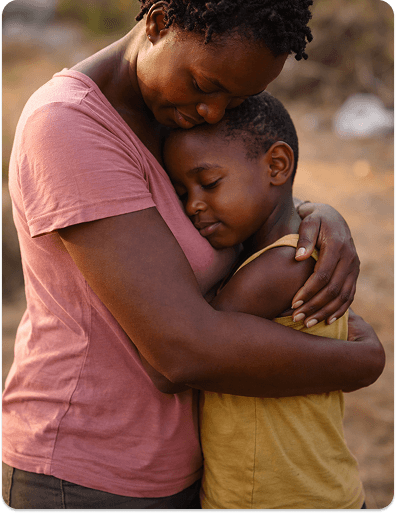 A mother embracing her child